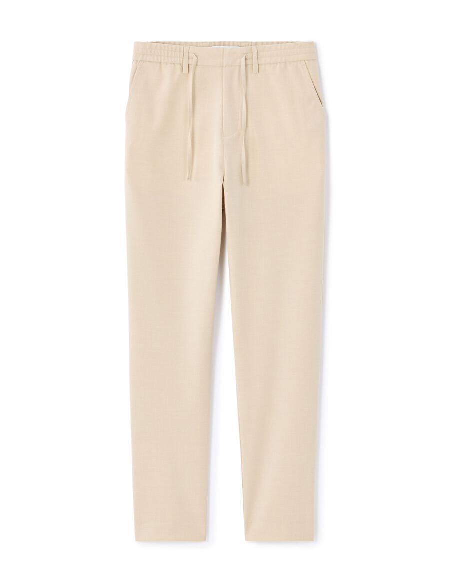 pantalones ajustados elásticos hasta el tobillo color beige claro para todo el día