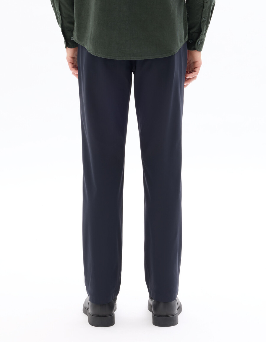 pantalones chinos de punto técnico elástico