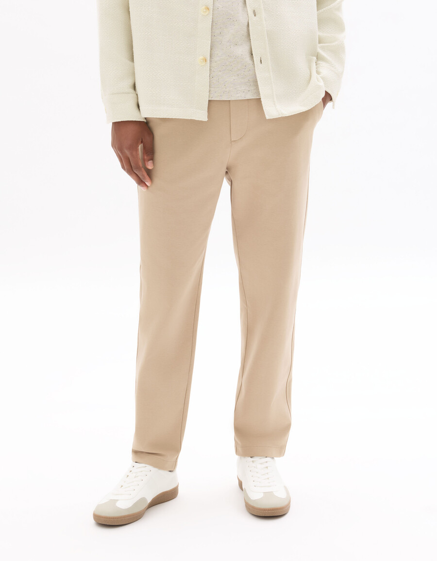 pantalones chinos de punto de corte entallado