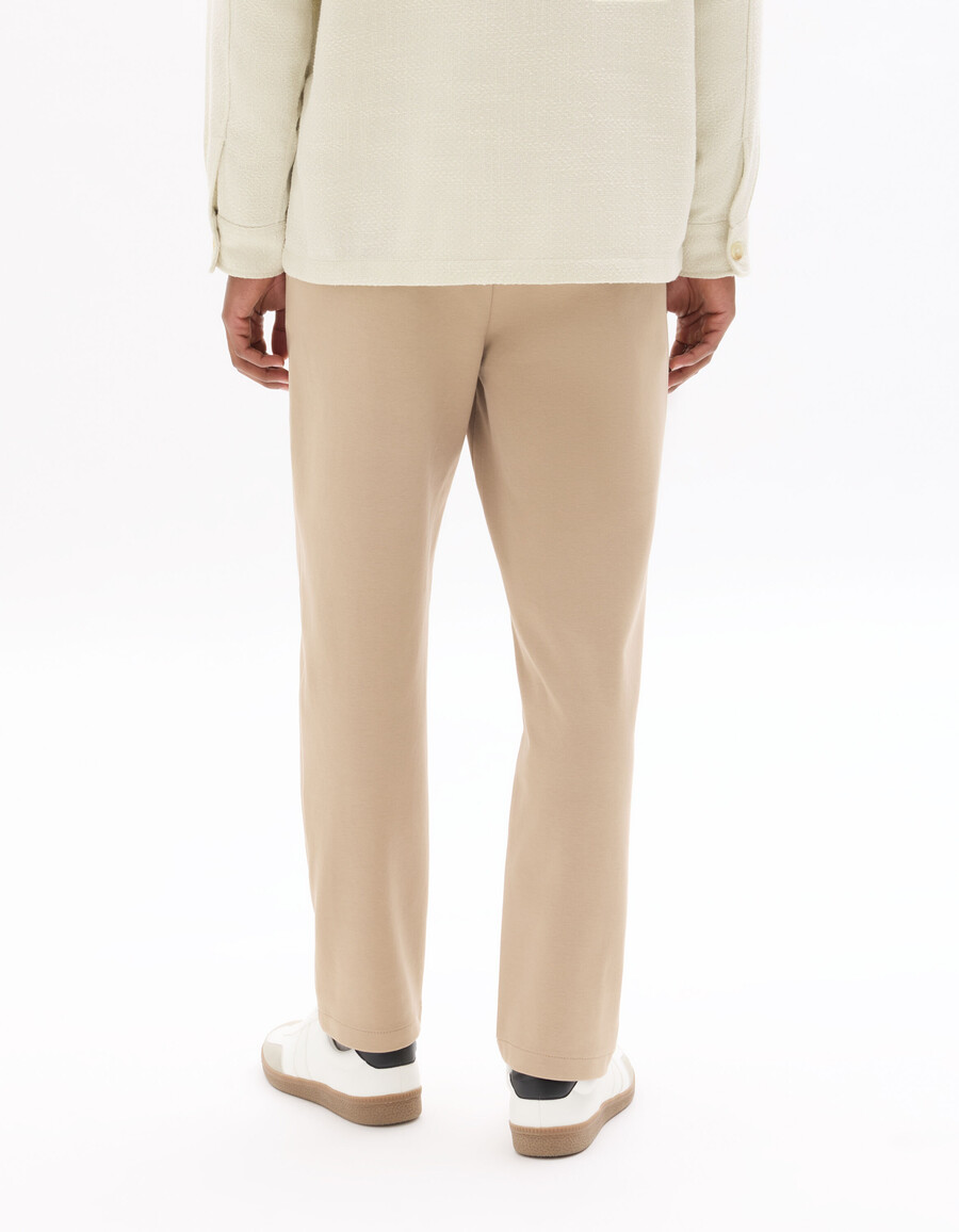 pantalones chinos de punto de corte entallado
