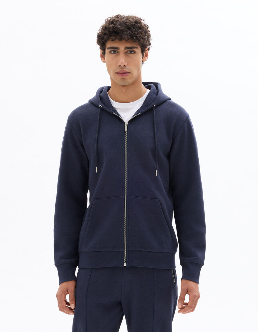 sudadera con capucha de piqué verde de corte regular y cremallera completa