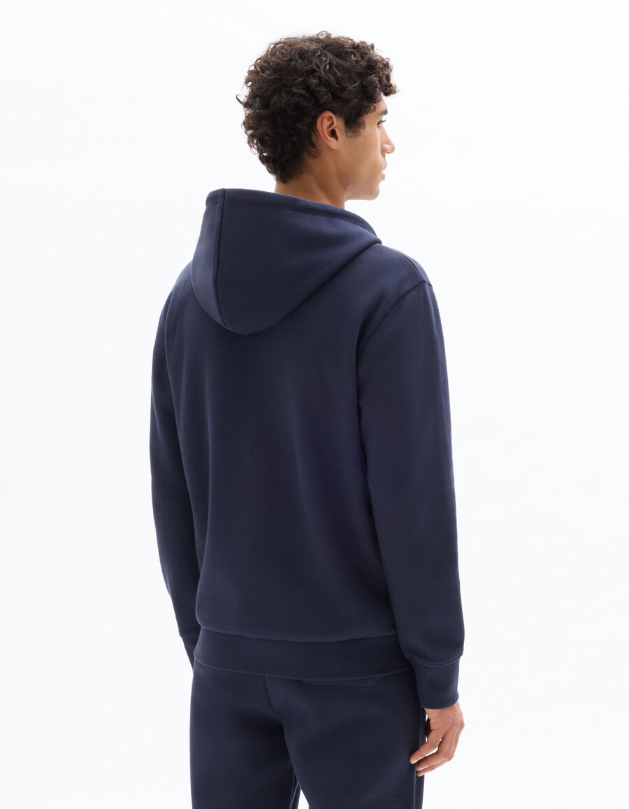 sudadera con capucha de piqué verde de corte regular y cremallera completa
